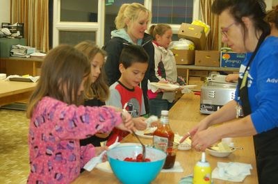 The Preeceville student representative council hosted a pancake breakfast on December 5 when Sheila Klebeck helped serve pancakes.