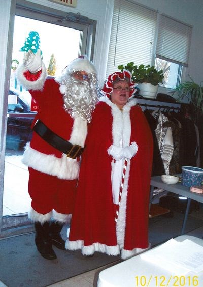 Members of the Keen Age Centre were surprised by a visit from Santa and Mrs. Claus during the Christmas supper on December 10.