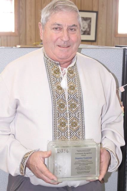 Stan with award
