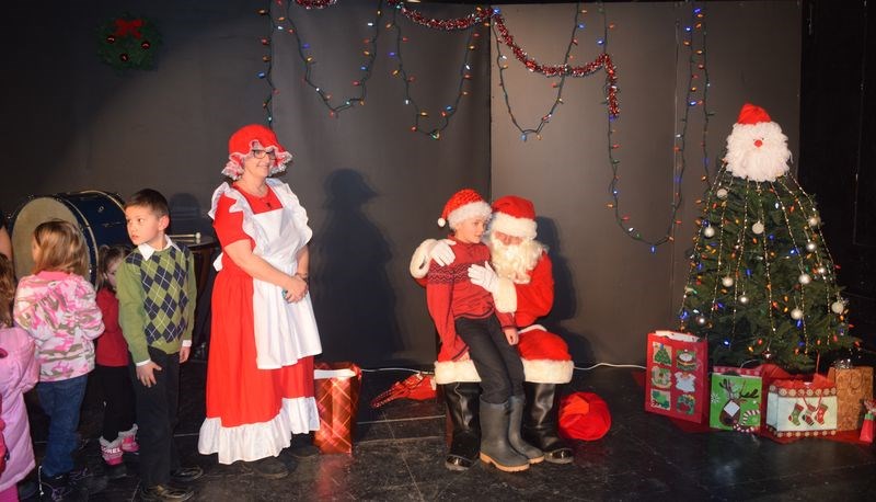 Santa Claus, accompanied by Mrs. Claus, made a special visit to the Kamsack Playhouse on Sunday to greet the children who participated in and watched the Community Christmas Concert.