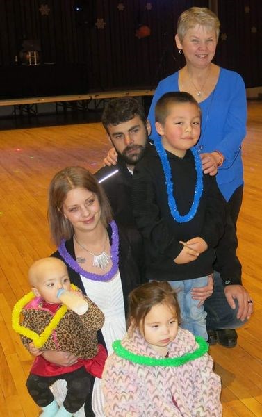 Zarah Gouge’s family members attended the benefit function held in support of the family which has been under added economic stress since Zarah has had to be in hospital in Saskatoon to fight the leukemia that was diagnosed in October. Clockwise, starting with Zarah at lower left, are: her mother Britney Durrell, father Richard Gouge, grandmother Mavis Durell, brother Daniel, and sister Zophya.