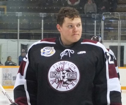 Zac Robidoux stands for O Canada prior to a game last season.