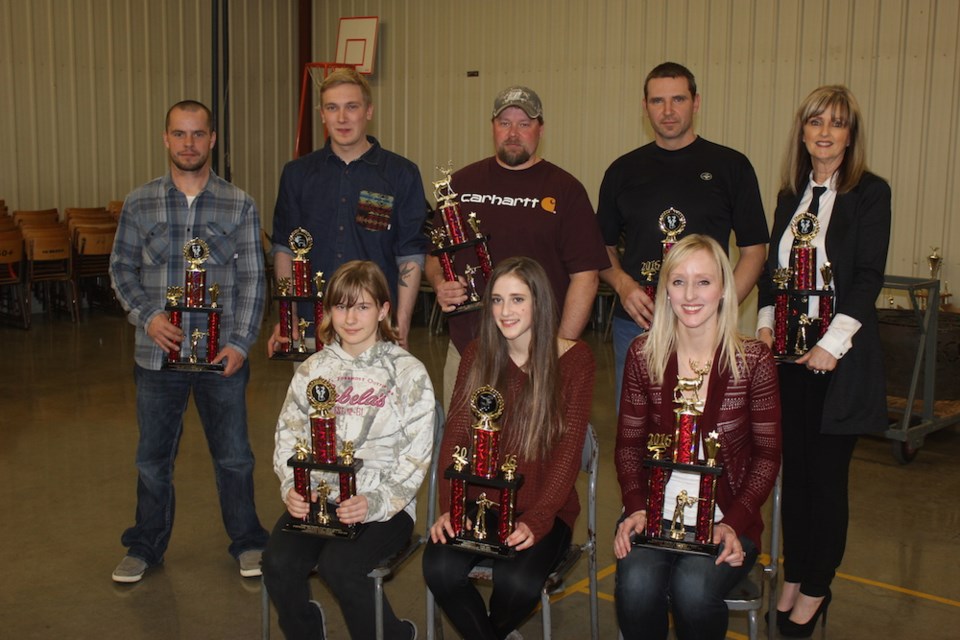 Trophy winners for big game rifle were: back row, from the left, Doug Van de Woestyne, Garret Schulte, Sam Peterson, Brad Zukewich and Wanda Michel. Front row: Kaylee Carlson, Mackenzie Skuce and Monica Lainton.
