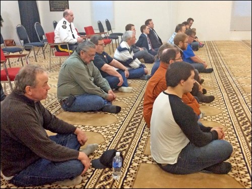 A gathering of about 100 people took part in interfaith services at the Islamic Centre in North Battleford in memory of those who were slain in a shooting at a Quebec City mosque Jan 29. Photos by John Cairns