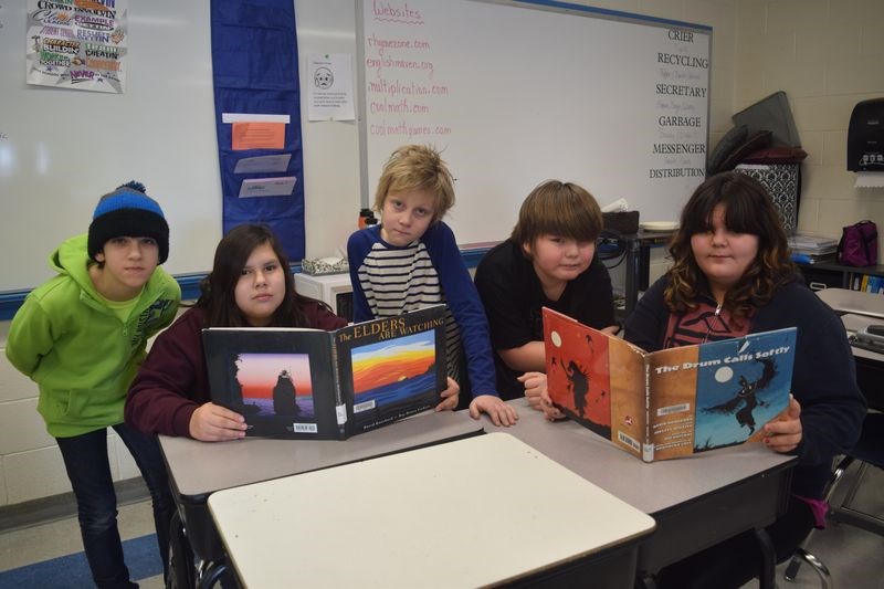KCI Grade 6 students were recently looking over a couple of the books dealing with First Nation culture which were purchased with funds from a Sunrise Health Promotions grant. From left, the students are: Tyler Filipchuk, Brooklyn Badger, Aiden Stone, Logan Badger-Cote and Ebony Whitehawk.