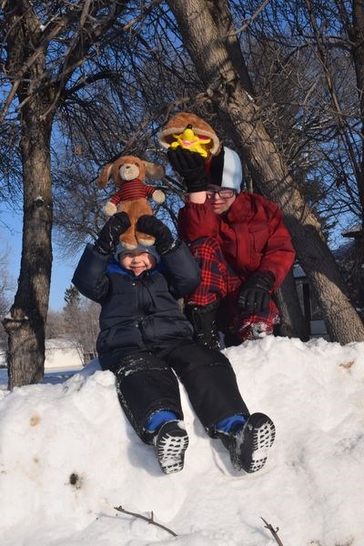 On Friday, Misha Mokrytskyy, left, and Timothy Holoboff, who were being tended by Ardis Irvine, agreed to practice for today, which is Groundhog Day, by finding a teddy bear and another plush toy to fill in for groundhogs. But on Friday, the sun was out, the “groundhogs” must have seen their shadows, and would therefore hide away for another six weeks. If the boys take their “groundhogs” out today and if they cast no shadows, that would mean spring is on its way.