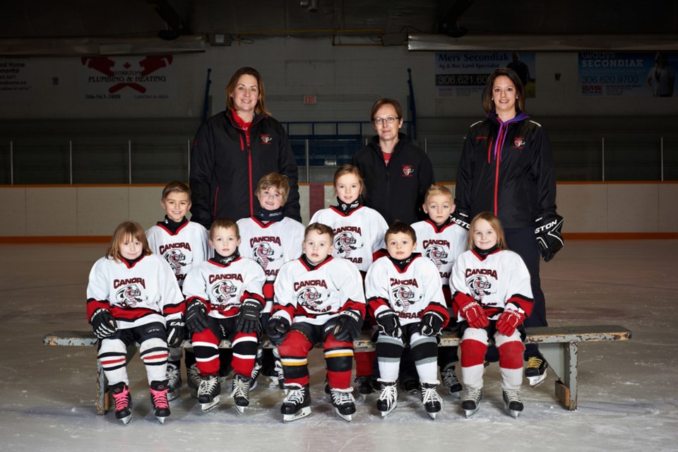 Members of the Canora White Squirts hockey team, from left, are: (back row) Meridee Kopelchuk (coach), Kim Wolkowski (manager) and Aimee Ruf (helper); (middle row) Knox Oswald, Colby Fast, Claire Ruf and Kruze Oswald, and (front) Priah Wolkowski, Wade Vangen, PJ Kruger, Maddox Sawka and Kenzee Kopelchuk.
PHOTOS COURTESY OF CANORA PHOTO AND FRAMING