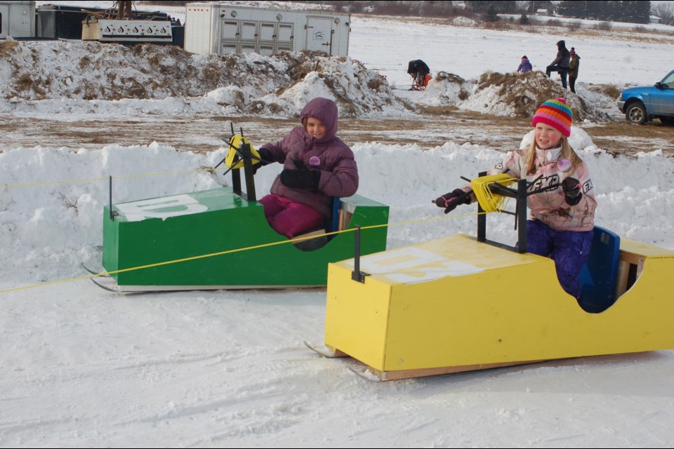 Sara Masko, left,and Graison Belesky enjoyed  the go carts.