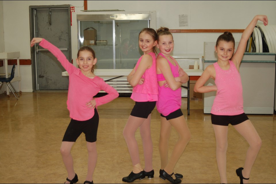 Dancers who performed a tap dance, from left, were: Maggie Bartel, Emerson Strykowski, Addison Danielson and Alexis Firman.