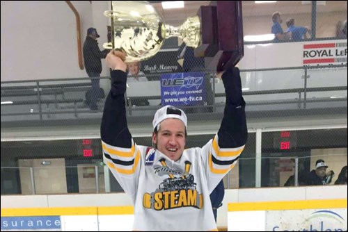 Flin Flon native Nathan Johnson hoists the Russell Cup as a member of the Tottenham Steam in 2016.