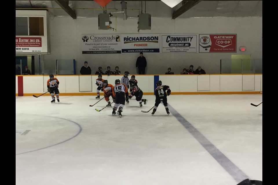 The Canora Atom Black team was on the ice during its win over Yorkton Deneschuk Home Terriers 4-3 on February 9. Taye Shukin (Centre) trying to speed past Yorkton’s centre with Chase Hembling (AP) on right wing and Brody Gulka on left wing. Kade Rubletz and Ty Sleeva are ready on defence (not pictured) with the bench intensely watching in the background.