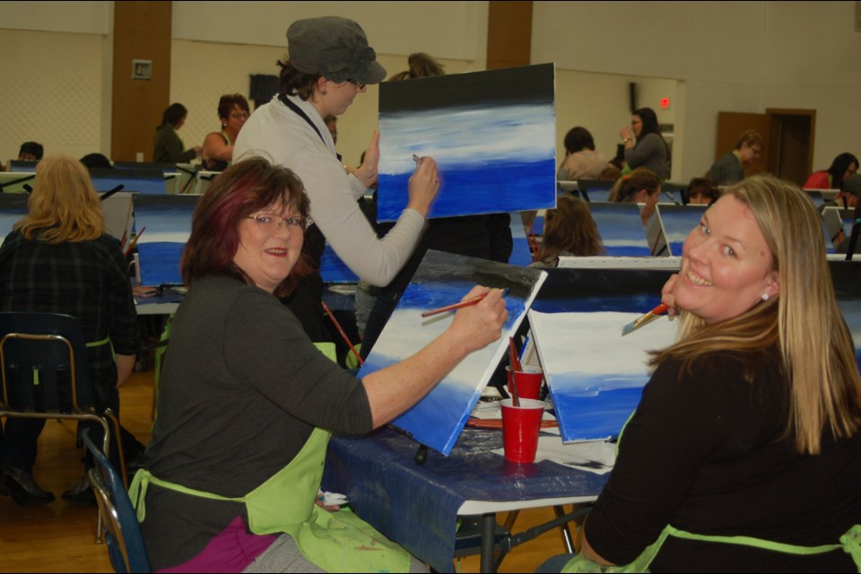 Some of the 103 community and surrounding area residents who were instructed in painting during a session in Preeceville on February 10, from left, were: Linda Shewchuk, Rebecca Winston and Rhea Pole, the instructor.