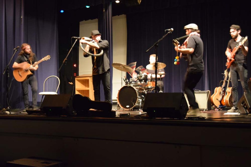 Performing its “exuberant, rousing” style of music that is inspired by the Chilean Andes Mountains onstage February 23 at the Canora Composite School auditorium was the band Andino Suns of Regina, from left, Andres Palma, Andres Davalos, (front man), Justin Hauck, (drums), Christian Moya and Danny Jones.