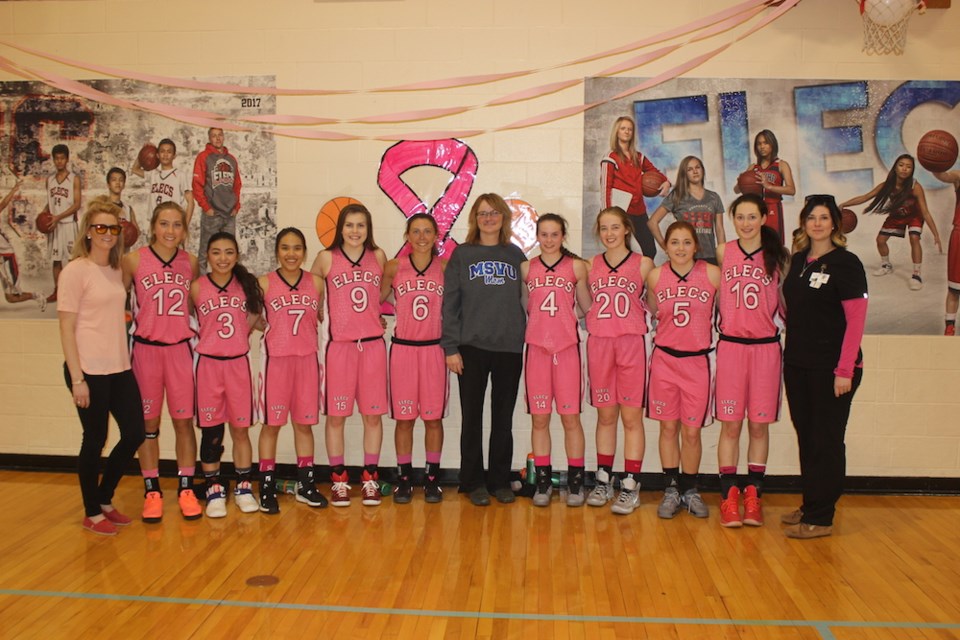 From the left, Elecs senior girls basketball coach Jessie Smoliak, players Kalee Donovan, Khrystal M