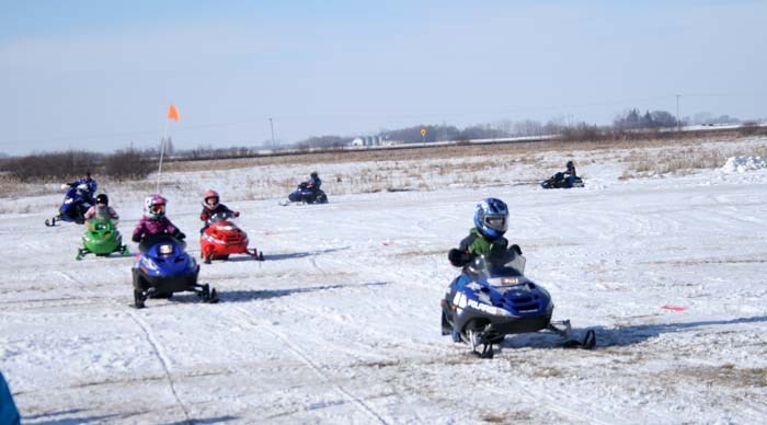 The youngest of riders hit a shortened course with their sleds.