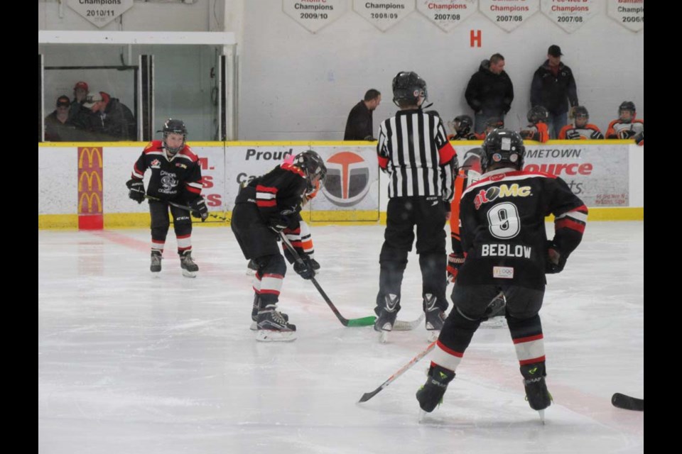 From left, Linden Roebuck, Alaina Roebuck and Briel Beblow lined up for a face off during the game with Yorkton on March 1.
