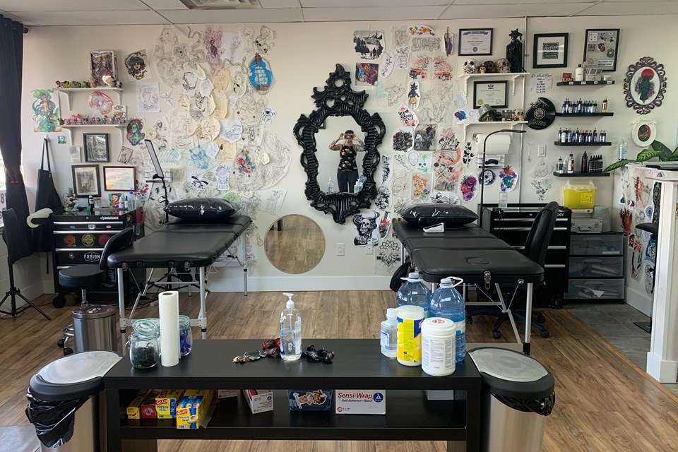 Tattoo shop honors cancer survivors, News