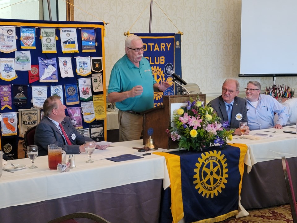 041024-don-poe-speaking-at-rotary