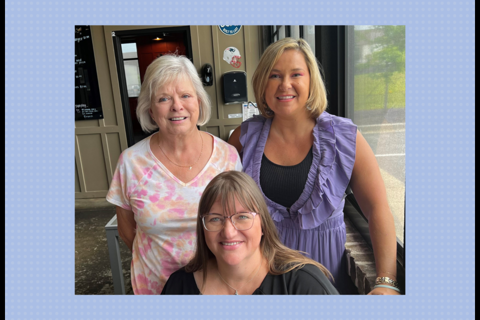 Top Row: Nancy Wilson and Ginny Hendley, and Front: Deb Blackburn -- planning for the Dance Through the Decades fundraiser