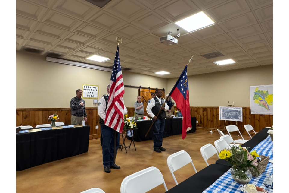 The Blue Knights of Georgia present our state's and nation's flags at the Brooklet Town Hall meeting Thursday evening. 