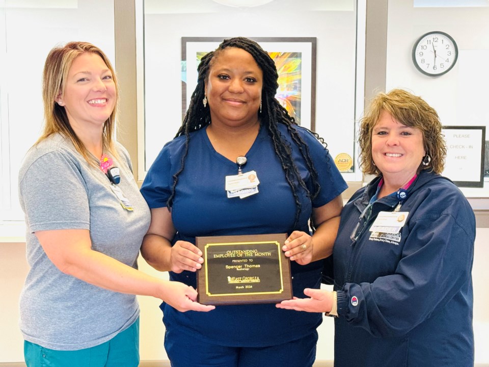 spenser-thomas-with-faith-gwinnett-asst-director-of-radiology-and-tammy-mascarello-right-director-of-radiology