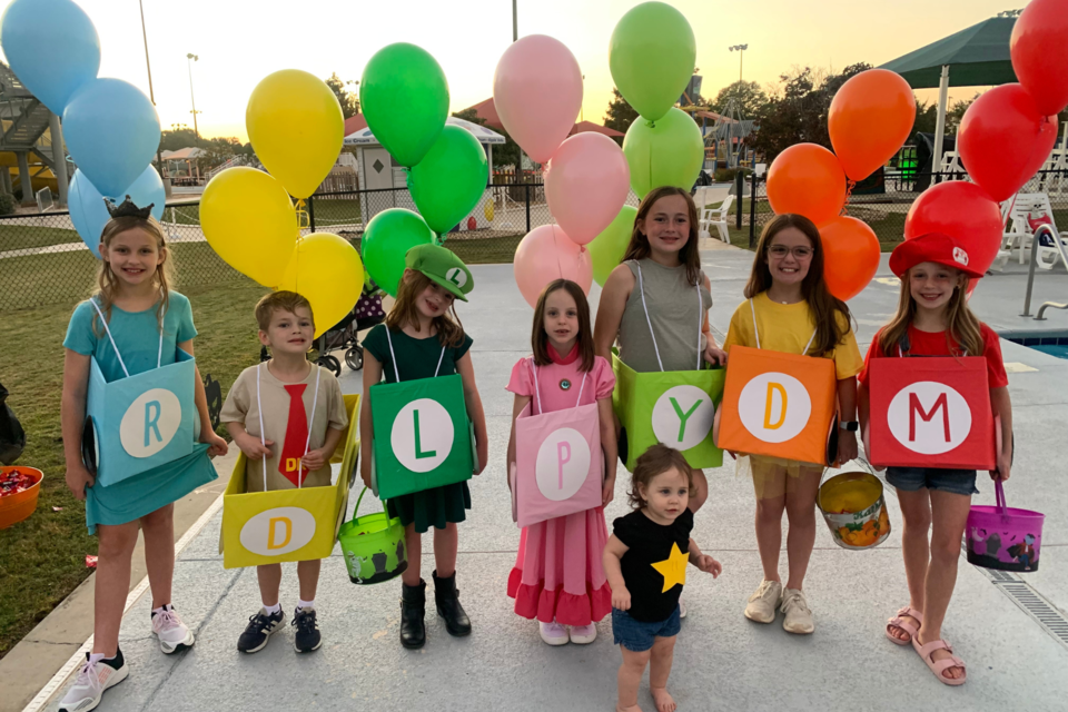 Splashy's Spookfest at Splash in the Boro 2023. Family dresses as characters from Mario Kart. 