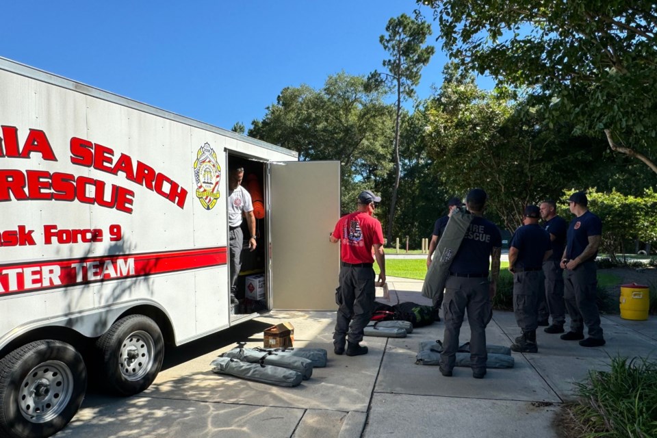 Emergency responders begin to pack up cots and equipment after receiving the 'all-clear'.
Image by Ainslie Smith