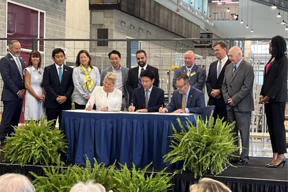 L-R: OTC President Lori Durden, HMGMA CEO Oscar Kwon and GS President Kyle Marrero sign agreement