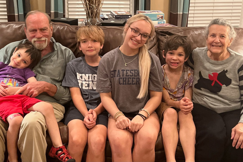 Ed and Maria with grandchildren
