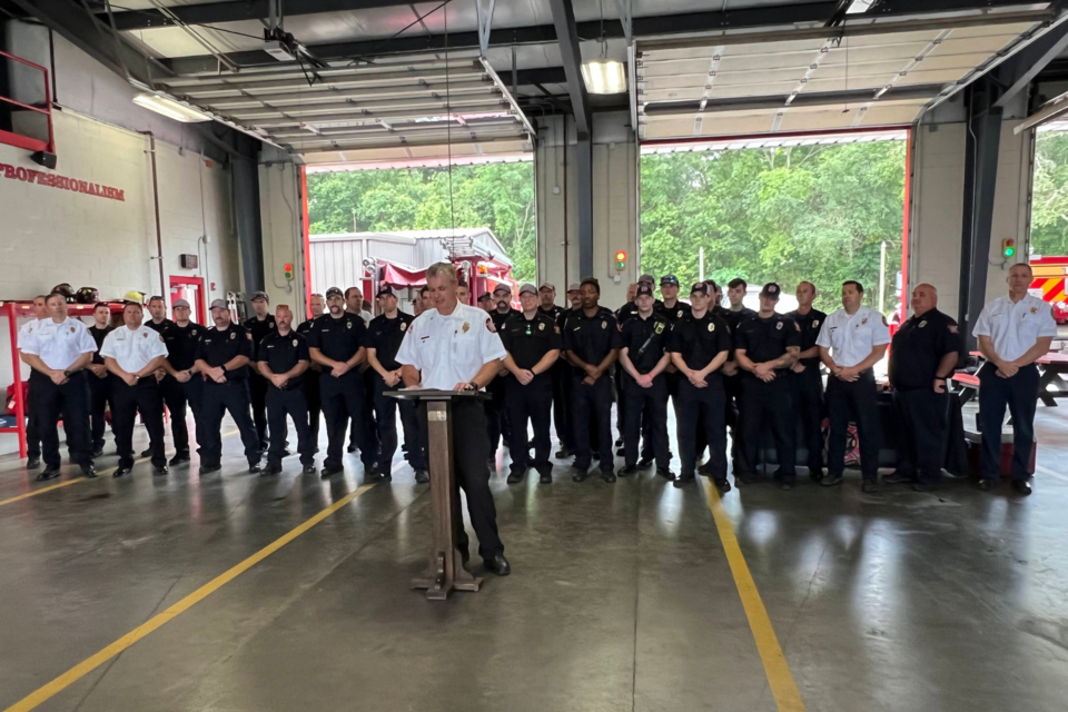 Chief Tim Grams addresses the audience during the ceremony