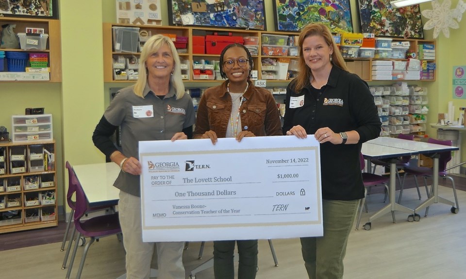 photo-2022-23-dnr-conservation-teacher-of-year-grant-recipient-vanessa-boone-c-with-dnrs-kim-kilgore-l-and-linda-may-credit_the-lovett-school