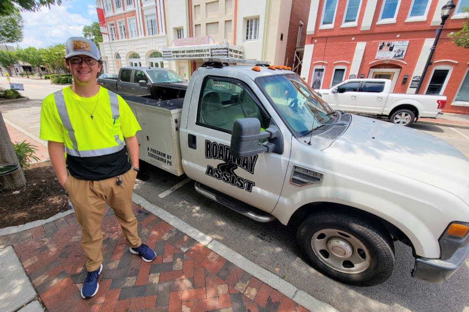Hunter Davis and Road Assist. Vehicle