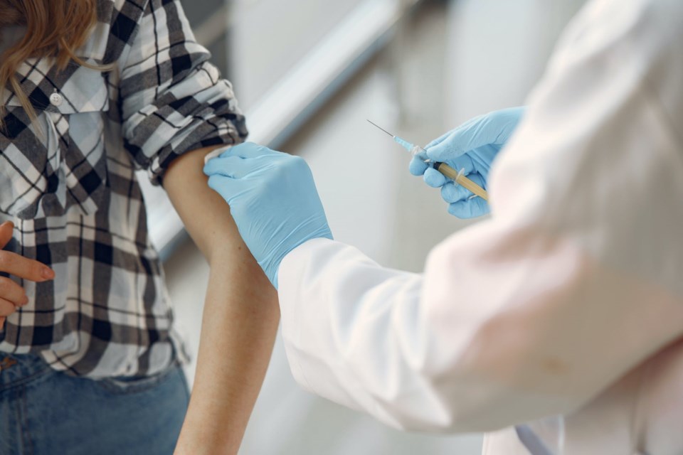 person getting vaccinated