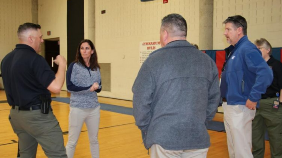 Bridget Melton, Ed.D., collaborates with leaders from the Georgia Public Safety Training Center.