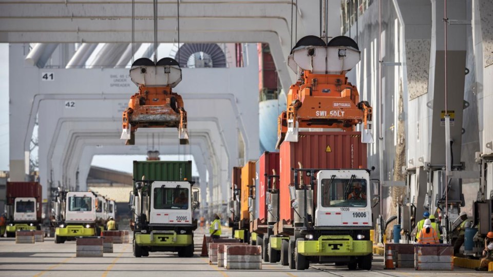 Export containers are loaded onto a Yang Ming vessel at the Port of Savannah’s Garden City Terminal. The Georgia Ports Authority is moving cargo at a rate of more than 6