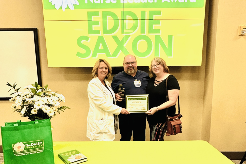 eddie-saxon-with-marie-burdett-and-cheryl-saxon