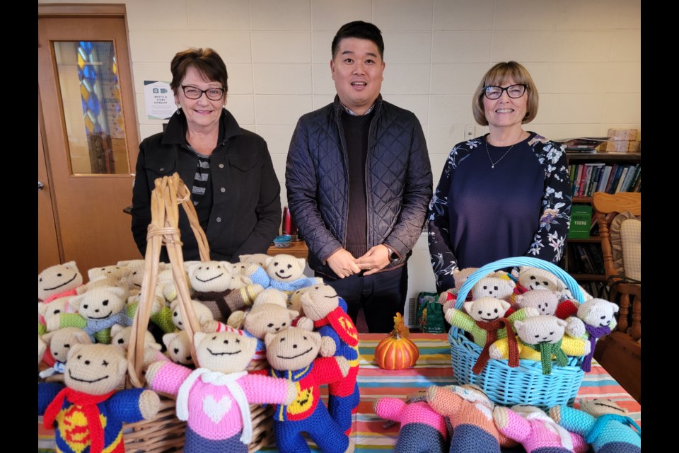 (From left) Sandy Grimwood, Rev. Dongwon Brian Jung, and Janet McKenna are ready to deliver 'Teddies for Comfort'.