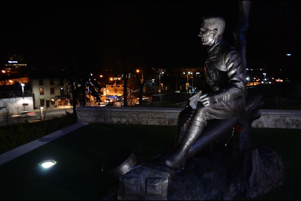 A sculpture of Guelph-born poet and military physician John McCrae overlooks the city on its 190th birthday.  Troy Bridgeman for GuelphToday.com