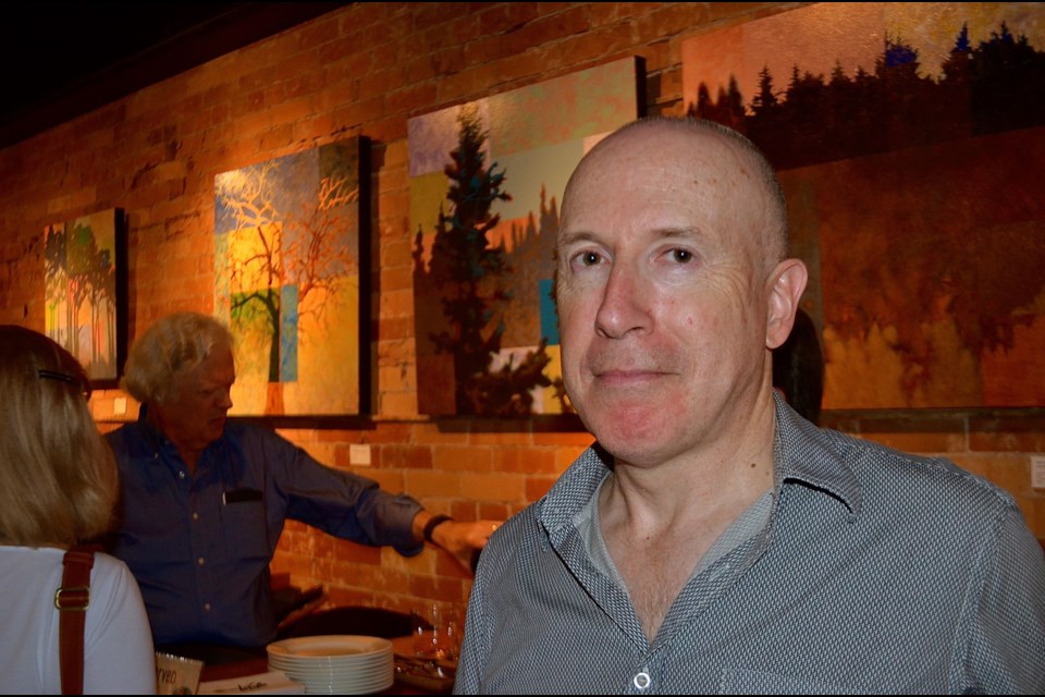 Artist Bob Young during the opening of the Tree Silhouettes exhibit Wednesday at Miijidaa Café & Bistro. Troy Bridgeman for GuelphToday.com