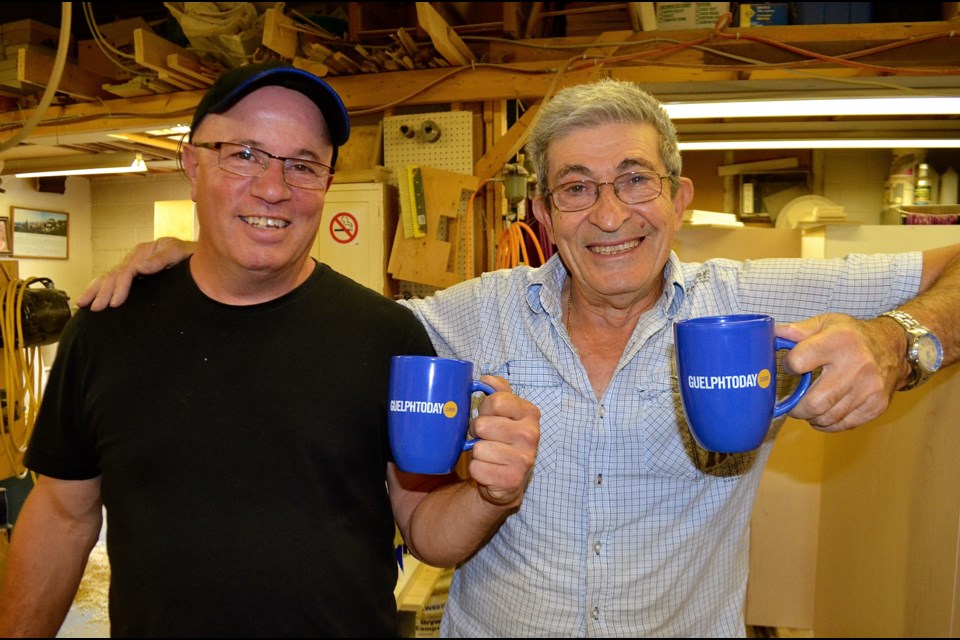 Mike Raso owner of Michelino’s Custom Woodworking with helper Joe Aramini.  Troy Bridgeman for GuelphToday.com