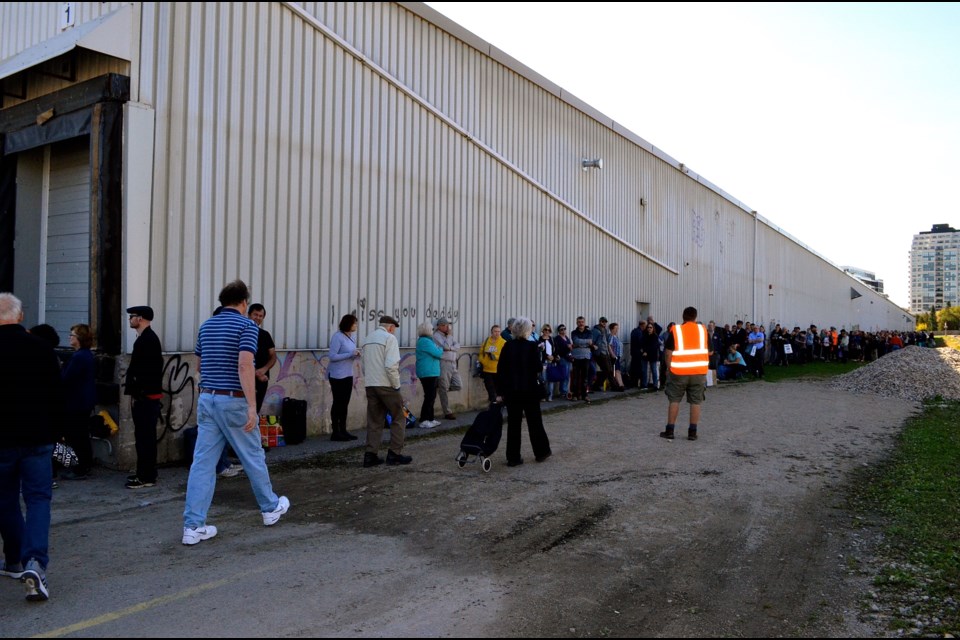 The line stretched the length of the factory warehouse.  Troy Bridgeman for GuelphToday.com