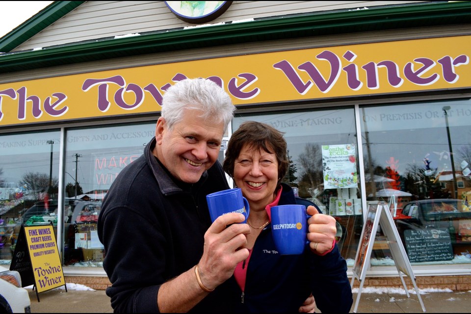 Barry Browne and Liz Woolford owners of The Towne Winer outside their shop on Downey Road.  Troy Bridgeman for GuelphToday.com