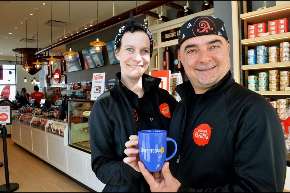Store manager Nancy Zajac and director of operations for Ontario and Western Canada Lou Struminikovski from Chocolats Favoris during the soft opening of their new location in Clair Marketplace.