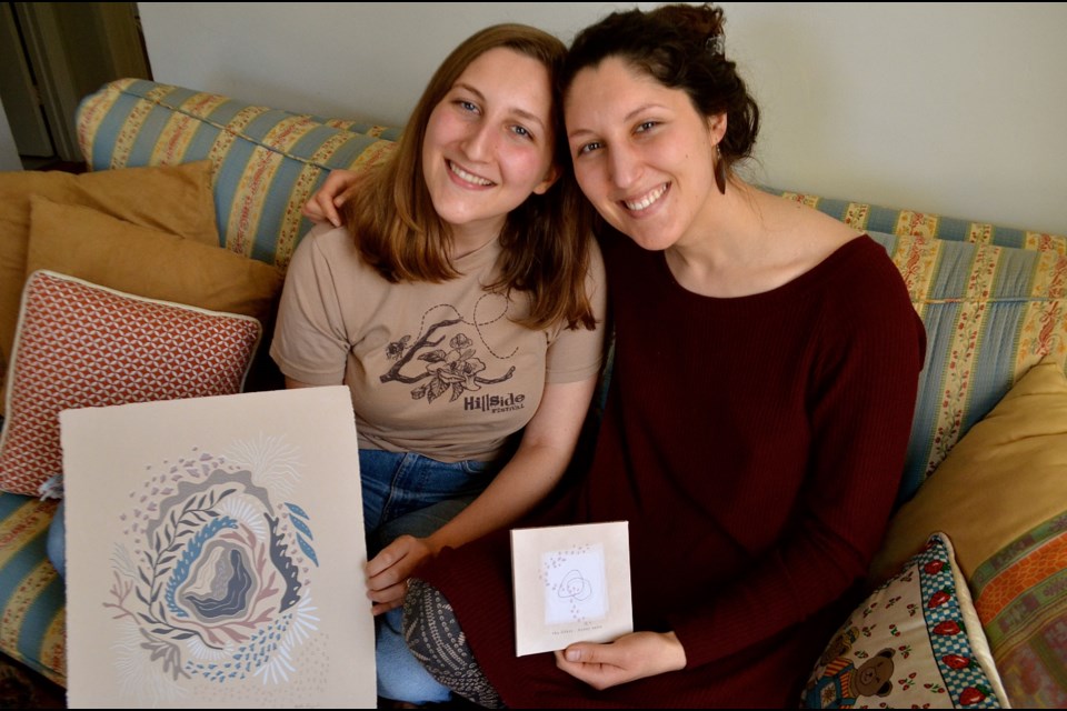 Anita and Liv Cazzola of The Lifers at home with some of their custom made promotional material for their new album Honey Suite. Troy Bridgeman from GuelphToday.com