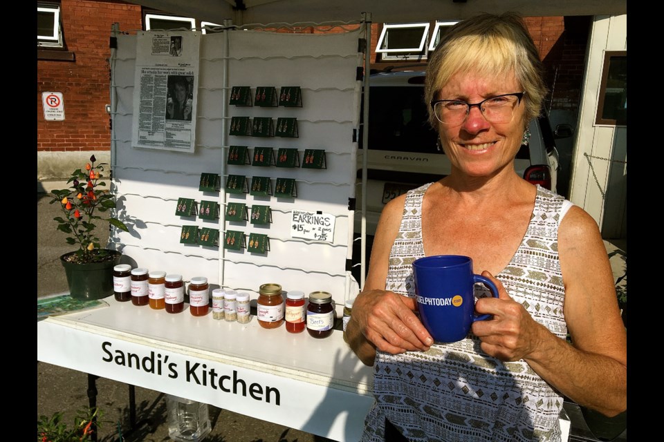Sandi Huish owner of Sandi’s Kitchen at her stand in the Guelph Farmers Market. Troy Bridgeman for GuelphToday.com