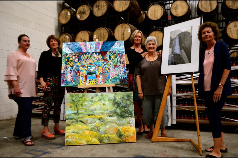 Sarah Dawkins, Sharyn Seibert, Joanne Poluch, Deborah Dryden and Annette Twist at the Wellington Brewery warehouse and site of the Art$Pay Now exhibit Sep 22 & 23.  Troy Bridgeman for GuelphToday.com