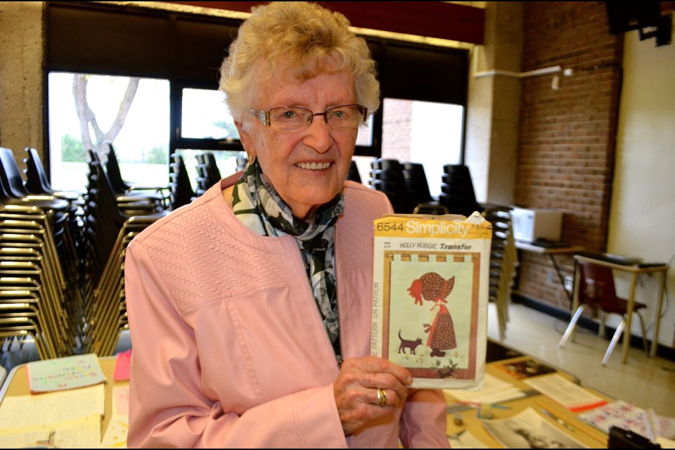 Retired home management teacher Vi Kramp with a pattern she put in the time capsule 40 years ago. Troy Bridgeman for GuelphToday