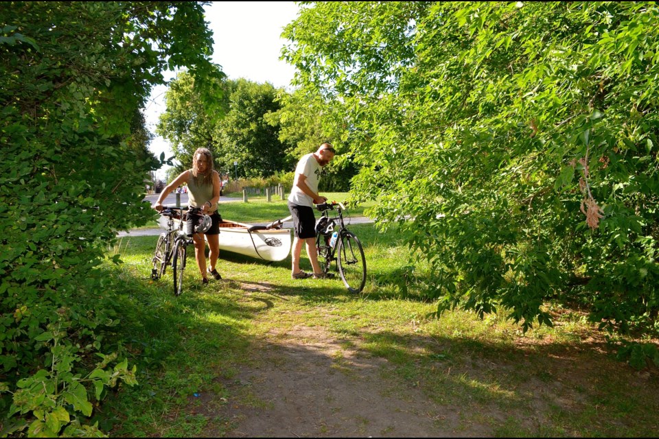 Jeremy Shute and Leslie Howarth arrive with their canoe at a clearing on the bank of the Speed River.  Troy Bridgeman for GuelphToday.com