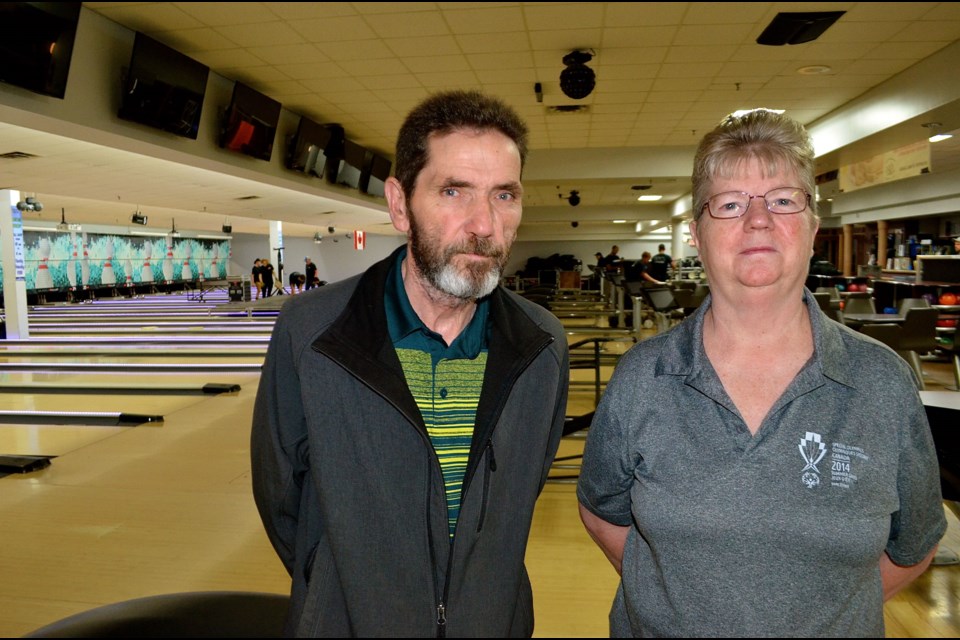 Woodlawn Bowl owner Bob McKay and manager Kathy MacKenzie prepare for the relaunch party Tuesday. Troy Bridgeman for GuelphToday.com