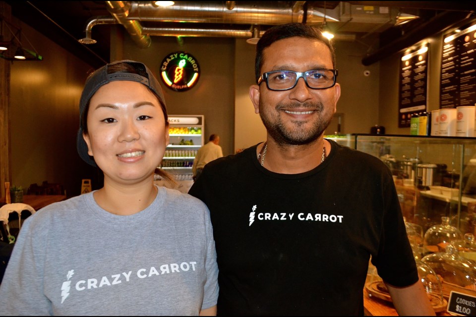 Crazy Carrot general manager Noriko Kato and owner Anurag Sood at their new restaurant on Wyndham Street.  Troy Bridgeman for GuelphToday.com